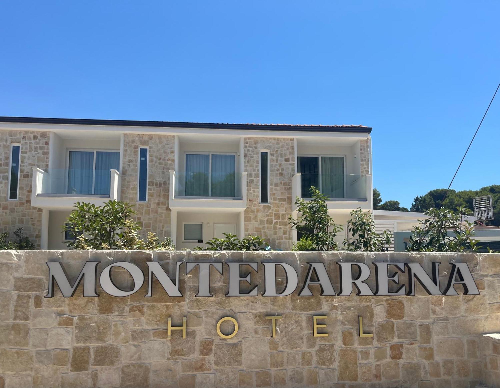 Montedarena Hotel Pulsano Bagian luar foto